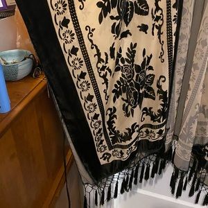 Free People kimono . One size fits all. Barely worn. Has fringe at the bottom.